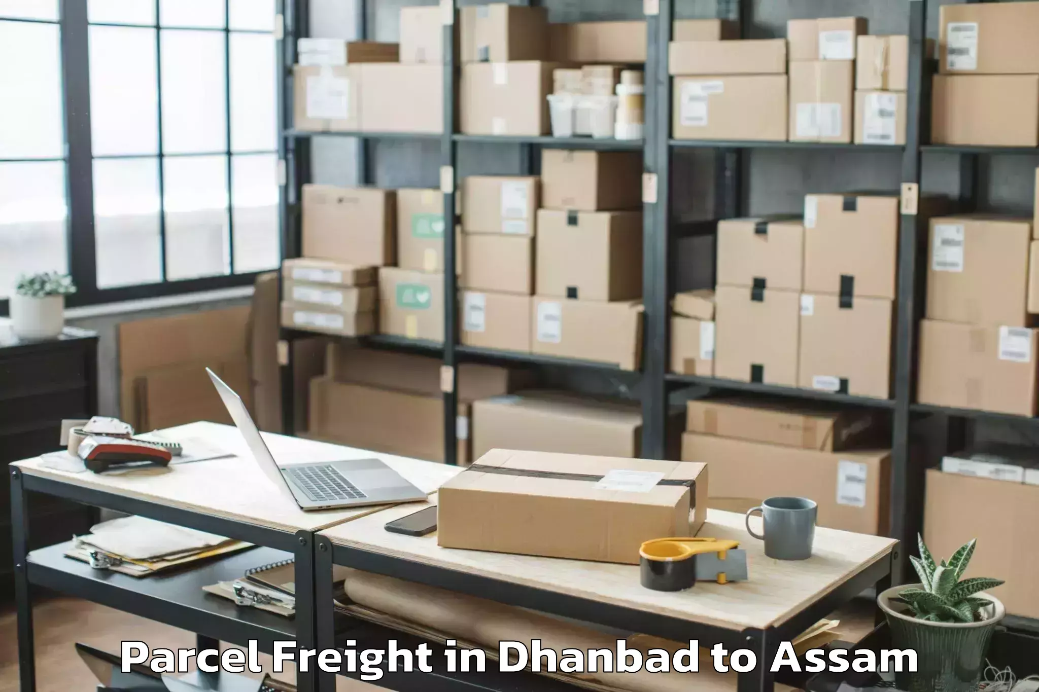 Leading Dhanbad to Sipajhar Parcel Freight Provider